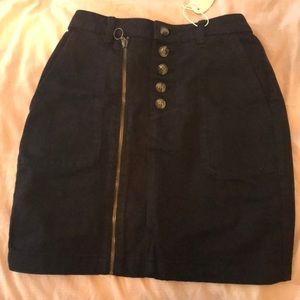 black skirt with bottoms and zipper